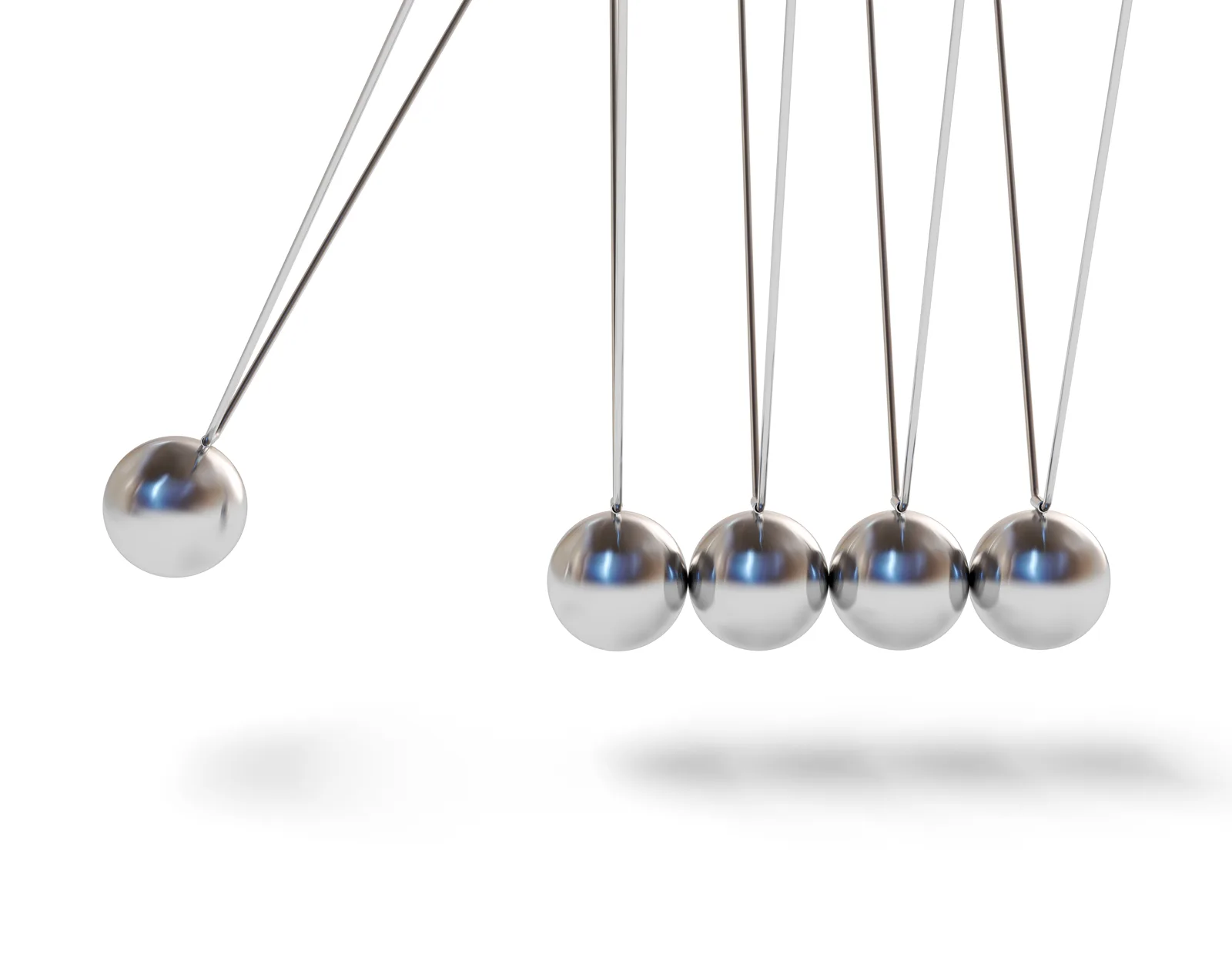 Kinetic balls swinging in endless repetitive motion, like a lever pulled again and again